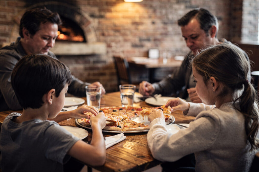 family dinner pizza directory v2 Langley BC Family Restaurants Kids Love family sharing pizza together at a Langley restaurant