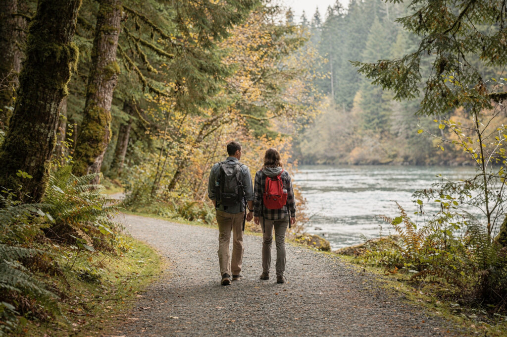 heritage area local hiking couple walking riverbank | GPS: 49.190659, -122.455289
